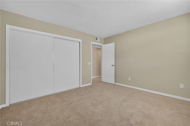 18557 Mescal St, Rowland Heights, CA 91748 - unfurnished bedroom with carpet flooring, baseboards, and a closet