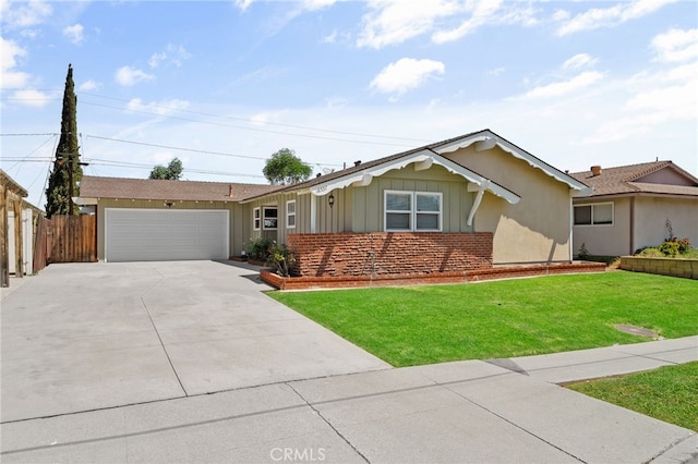 18557 Mescal St, Rowland Heights, CA 91748 - single story home with concrete driveway, a garage, and board and batten siding