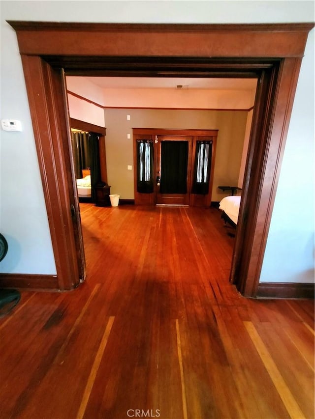1948 K St, Merced, CA 95340 - corridor with wood finished floors and baseboards
