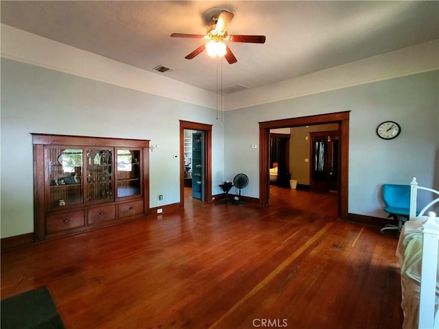 1948 K St, Merced, CA 95340 - living room with baseboards, ceiling fan, and wood finished floors