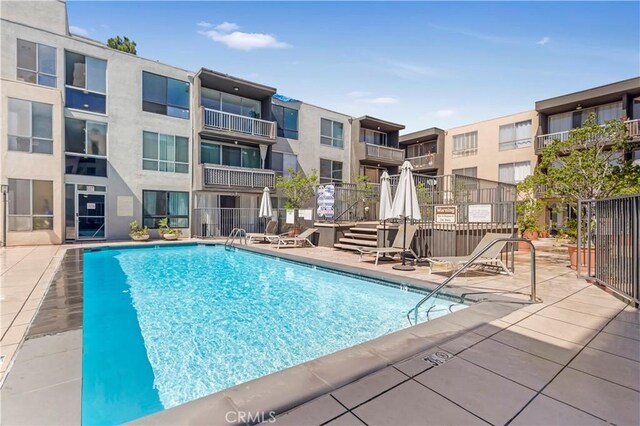 1745 Camino Palmero St Unit 107, Los Angeles, CA 90046 - community pool with a patio area