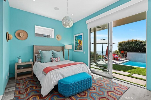 1088 Del Mar Ave, Laguna Beach, CA 92651 - bedroom with access to exterior, recessed lighting, and wood finished floors