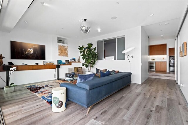1088 Del Mar Ave, Laguna Beach, CA 92651 - living room with light wood finished floors, recessed lighting, beverage cooler, and washer / clothes dryer