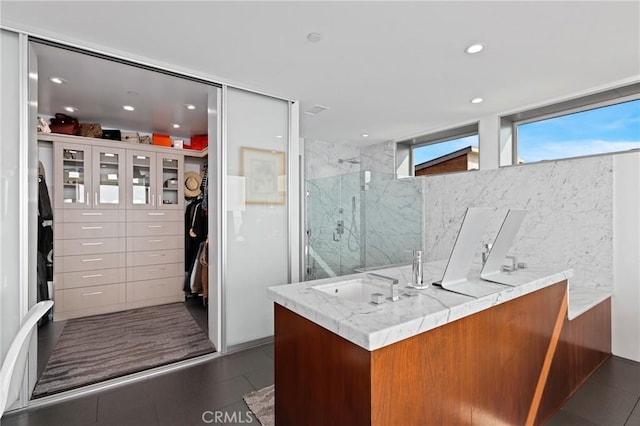 1088 Del Mar Ave, Laguna Beach, CA 92651 - full bathroom with a marble finish shower, a spacious closet, double vanity, tile patterned floors, and recessed lighting