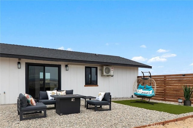 1561 Shoshone Valley Rd Unit 29, Palms, CA 92277 - back of house featuring a fire pit, a cooling unit, and roof with shingles