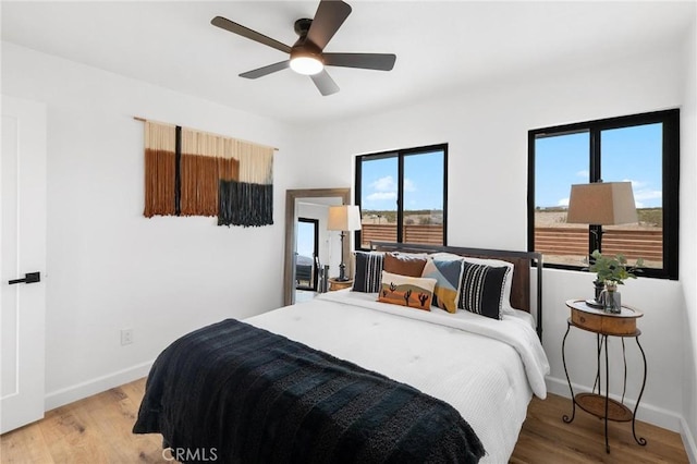 1561 Shoshone Valley Rd Unit 29, Palms, CA 92277 - bedroom featuring light wood-type flooring, baseboards, and ceiling fan