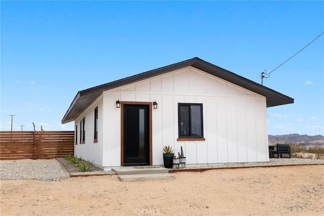 1561 Shoshone Valley Rd Unit 29, Palms, CA 92277 - back of house featuring board and batten siding