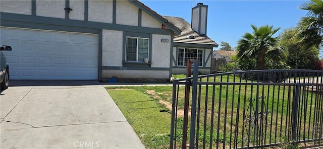 25651 Dracaea Ave, Moreno Valley, CA 92553 - view of property exterior featuring a chimney, stucco siding, an attached garage, concrete driveway, and a tiled roof