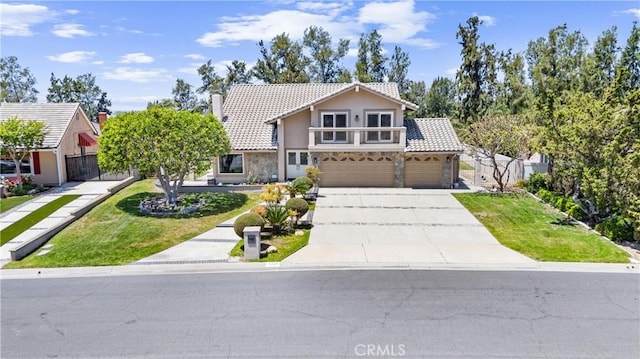 6421 Acacia Hill Dr, Yorba Linda, CA 92886 - view of front of house with a tiled roof, driveway, a front yard, and stucco siding