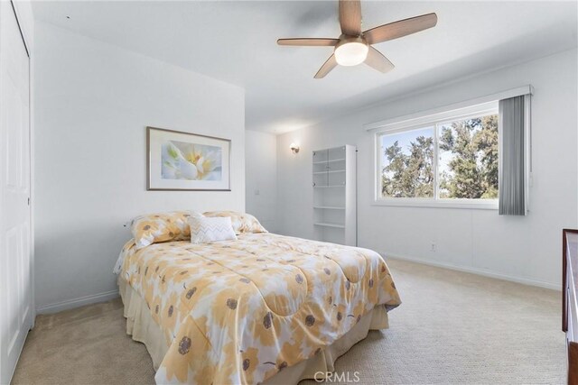 6421 Acacia Hill Dr, Yorba Linda, CA 92886 - bedroom featuring light colored carpet, baseboards, and a ceiling fan