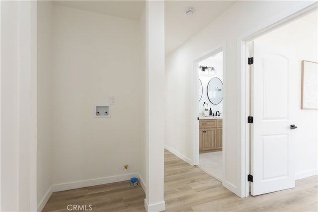 1116 W 80th St, Los Angeles, CA 90044 - hallway featuring light wood finished floors and baseboards