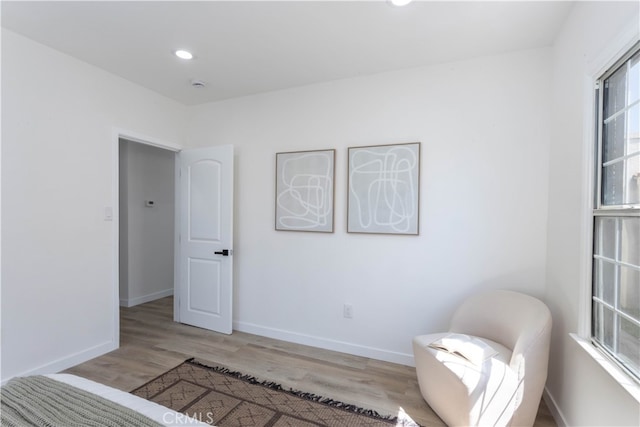 1116 W 80th St, Los Angeles, CA 90044 - living area featuring light wood finished floors, baseboards, and recessed lighting