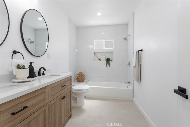 1116 W 80th St, Los Angeles, CA 90044 - full bath with double vanity, toilet, shower / bathtub combination, and recessed lighting