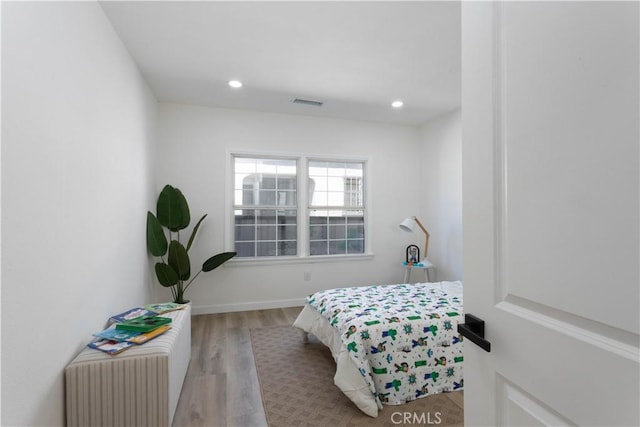 1116 W 80th St, Los Angeles, CA 90044 - bedroom featuring wood finished floors and recessed lighting