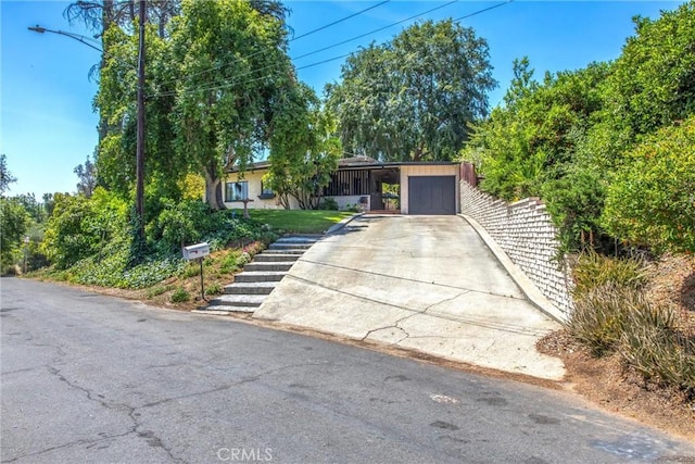 1872 Arroyo Dr, Riverside, CA 92506 - view of front of house featuring driveway