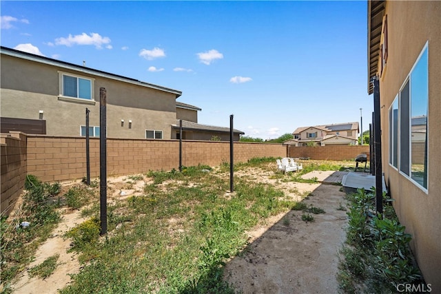11877 Crossbill Way, Jurupa Valley, CA 91752 - fenced backyard featuring a patio area