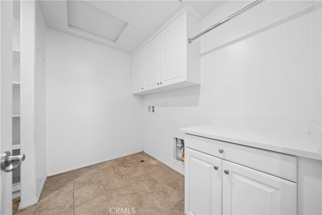 11877 Crossbill Way, Jurupa Valley, CA 91752 - washroom with cabinet space, washer hookup, attic access, and baseboards