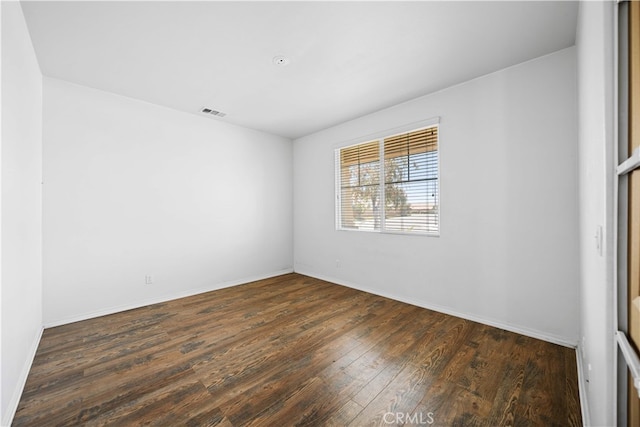 11877 Crossbill Way, Jurupa Valley, CA 91752 - unfurnished room with wood finished floors and baseboards