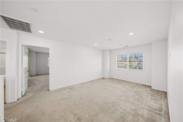 11877 Crossbill Way, Jurupa Valley, CA 91752 - unfurnished room featuring light colored carpet, baseboards, and recessed lighting