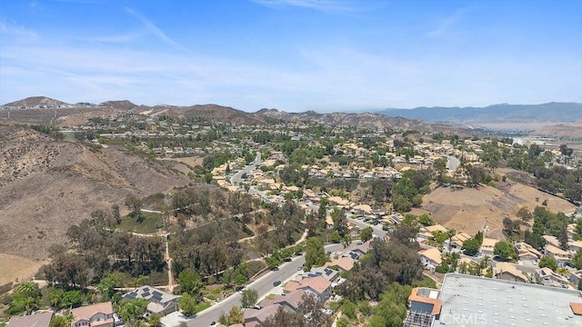 27721 Wakefield Rd, Castaic, CA 91384 - aerial view of property and surrounding area with mountains and nearby suburban area