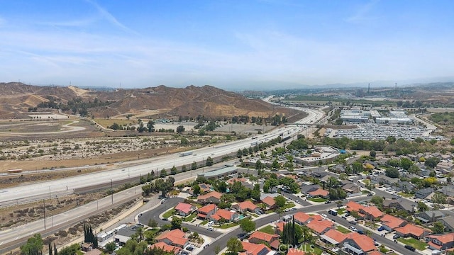 27721 Wakefield Rd, Castaic, CA 91384 - aerial view of property's location featuring a highway, a mountain backdrop, and nearby suburban area