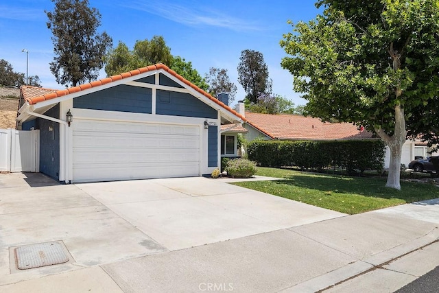 27721 Wakefield Rd, Castaic, CA 91384 - ranch-style house featuring a tiled roof, a garage, concrete driveway, and stucco siding