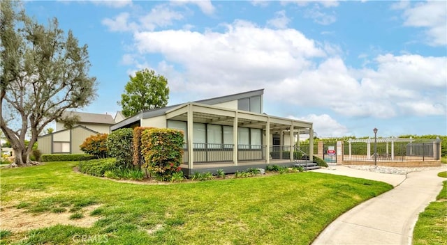 5526 Donner Ave, Buena Park, CA 90621 - rear view of property with a lawn