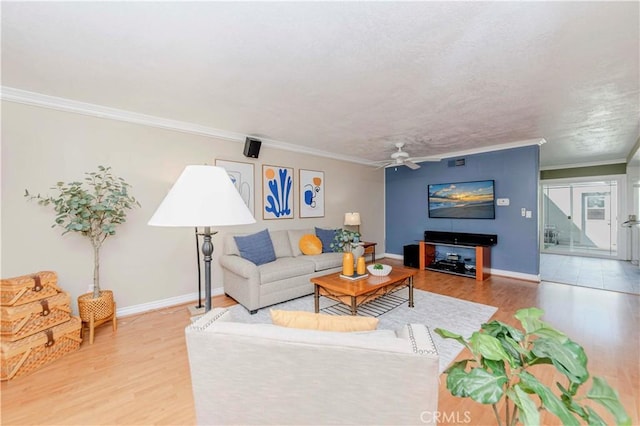 5526 Donner Ave, Buena Park, CA 90621 - living area with wood finished floors, ceiling fan, baseboards, and ornamental molding