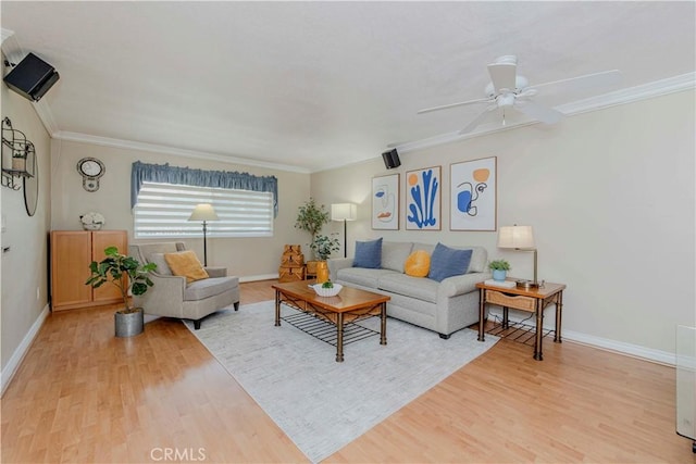 5526 Donner Ave, Buena Park, CA 90621 - living area with light wood finished floors, baseboards, ornamental molding, and a ceiling fan