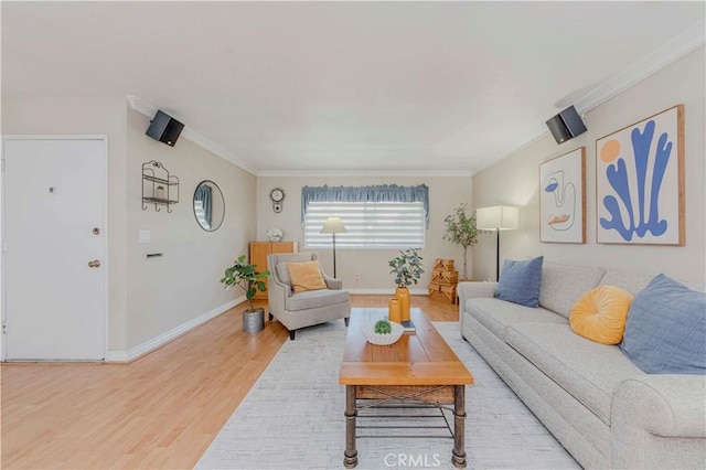 5526 Donner Ave, Buena Park, CA 90621 - living room featuring light wood-style flooring, baseboards, and crown molding