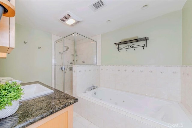5526 Donner Ave, Buena Park, CA 90621 - bathroom featuring a stall shower, a tub with jets, and vanity