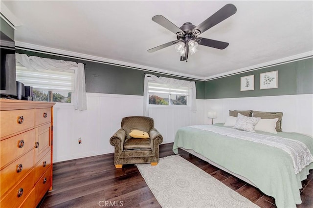 5526 Donner Ave, Buena Park, CA 90621 - bedroom with wainscoting, dark wood-style flooring, ceiling fan, and ornamental molding