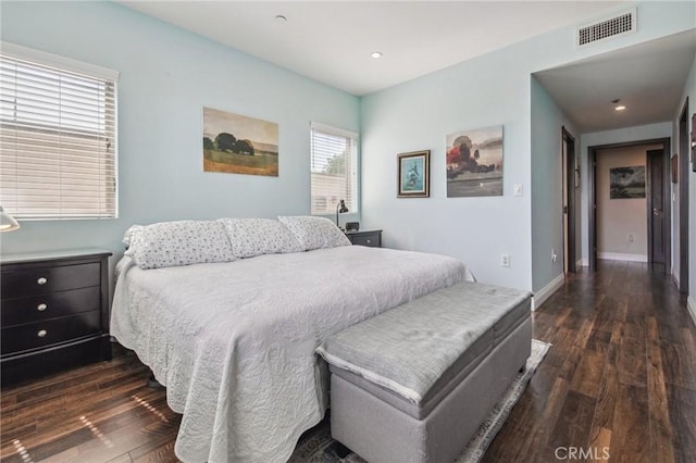 11218 Camarillo St Unit 305, Toluca Lake, CA 91602 - bedroom with dark wood-type flooring, recessed lighting, and baseboards