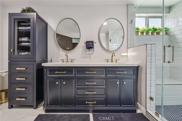 11218 Camarillo St Unit 305, Toluca Lake, CA 91602 - bathroom with double vanity, a shower stall, and marble look tile flooring