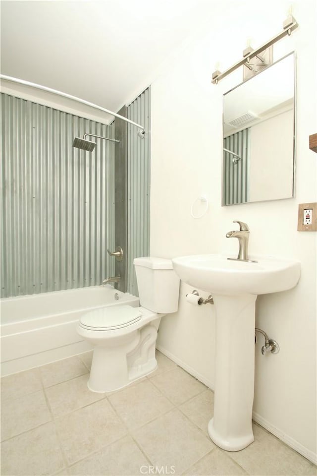 57620 Buena Vista Dr, Yucca Valley, CA 92284 - bathroom featuring tile patterned flooring, toilet, shower / bath combination, and baseboards