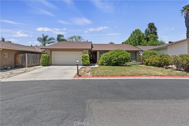 819 Shade Tree Ln, Fallbrook, CA 92028 - view of front of property with stucco siding, an attached garage, and concrete driveway