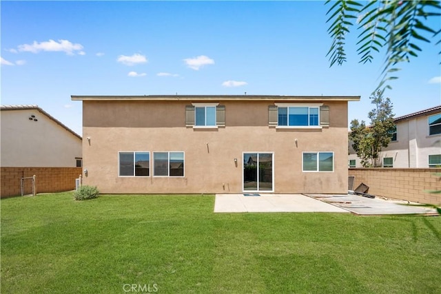 11836 Crossbill Way, Jurupa Valley, CA 91752 - back of property featuring a patio area and stucco siding