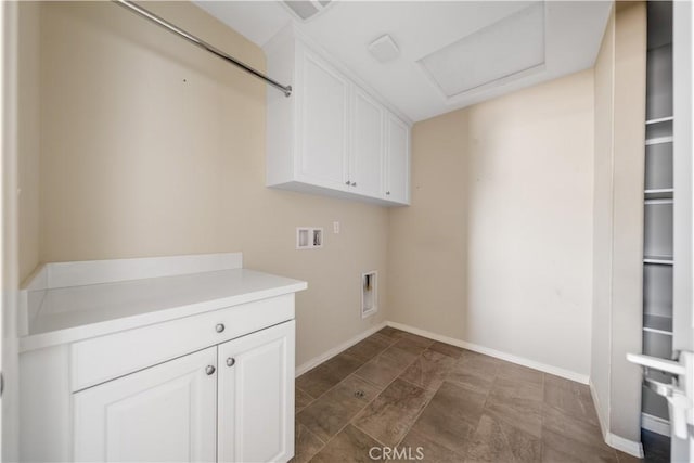 11836 Crossbill Way, Jurupa Valley, CA 91752 - laundry area featuring cabinet space, hookup for a washing machine, attic access, and baseboards