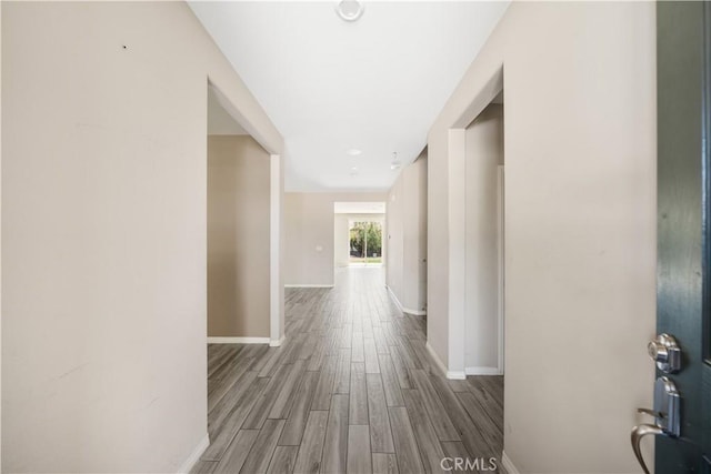 11836 Crossbill Way, Jurupa Valley, CA 91752 - hall with wood finished floors and baseboards
