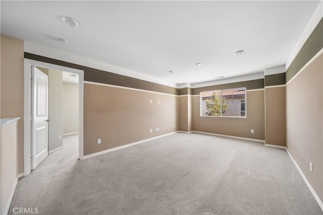 11836 Crossbill Way, Jurupa Valley, CA 91752 - carpeted spare room with baseboards and a smoke detector