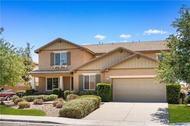 11836 Crossbill Way, Jurupa Valley, CA 91752 - view of front of home with a garage, driveway, and stucco siding