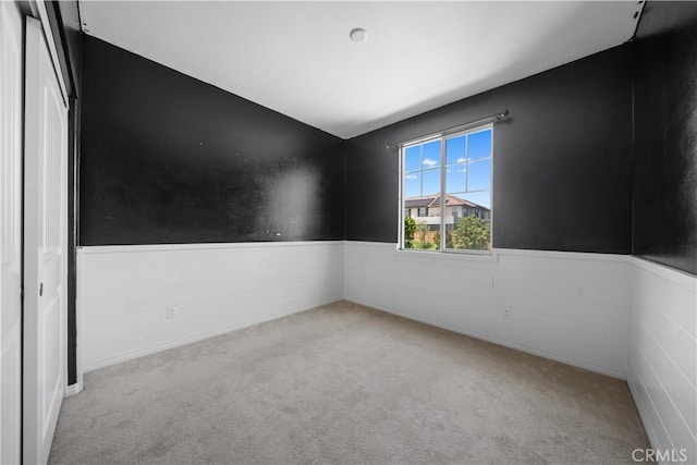 11836 Crossbill Way, Jurupa Valley, CA 91752 - carpeted empty room featuring a wainscoted wall