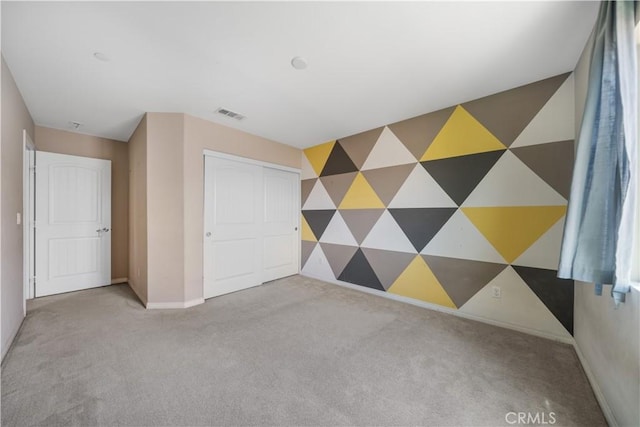11836 Crossbill Way, Jurupa Valley, CA 91752 - unfurnished bedroom with carpet floors, baseboards, and a closet