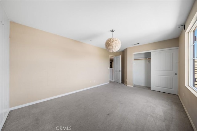 11836 Crossbill Way, Jurupa Valley, CA 91752 - unfurnished bedroom with carpet floors, baseboards, and a closet