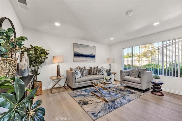 13338 Woodbrook Cir, Garden Grove, CA 92844 - living room featuring baseboards, wood finished floors, and recessed lighting