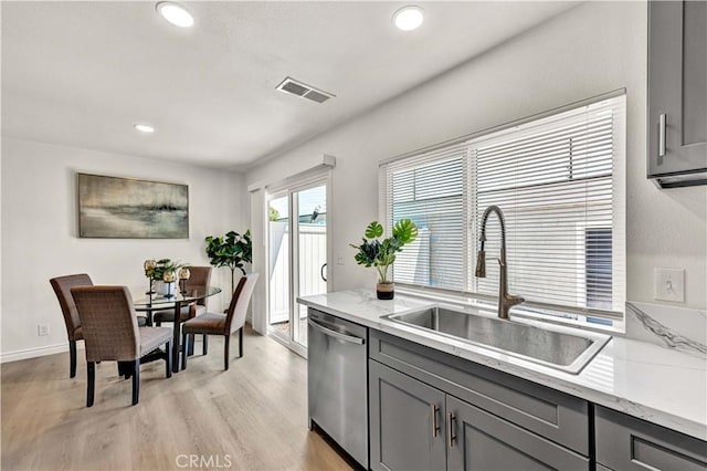 13338 Woodbrook Cir, Garden Grove, CA 92844 - kitchen featuring gray cabinets, dishwasher, a sink, light wood-style flooring, and recessed lighting