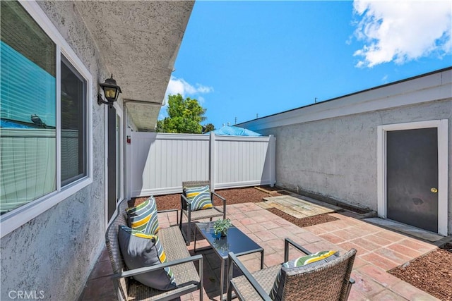 13338 Woodbrook Cir, Garden Grove, CA 92844 - view of patio featuring an outdoor living space