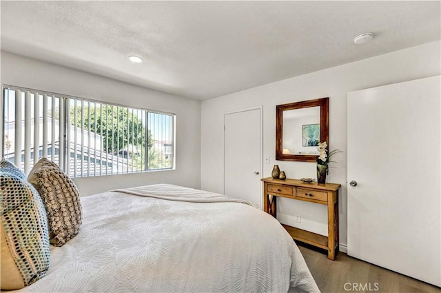 13338 Woodbrook Cir, Garden Grove, CA 92844 - bedroom featuring wood finished floors and recessed lighting