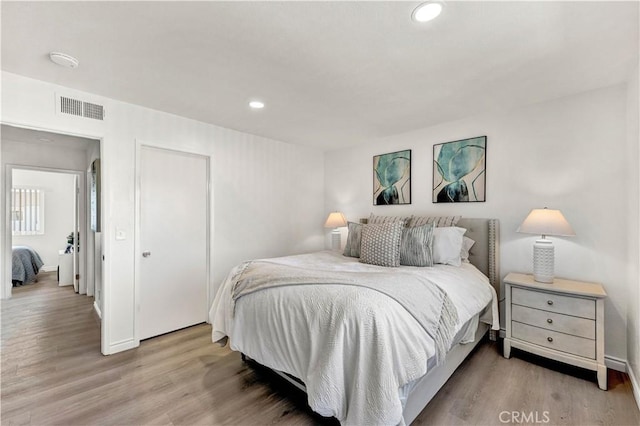 13338 Woodbrook Cir, Garden Grove, CA 92844 - bedroom with wood finished floors, recessed lighting, and baseboards