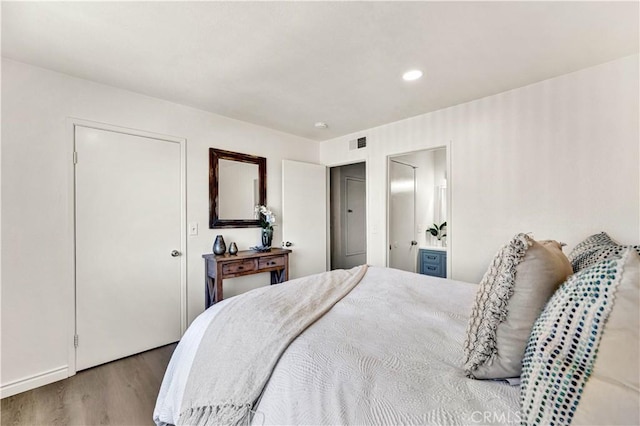 13338 Woodbrook Cir, Garden Grove, CA 92844 - bedroom featuring wood finished floors, connected bathroom, and recessed lighting